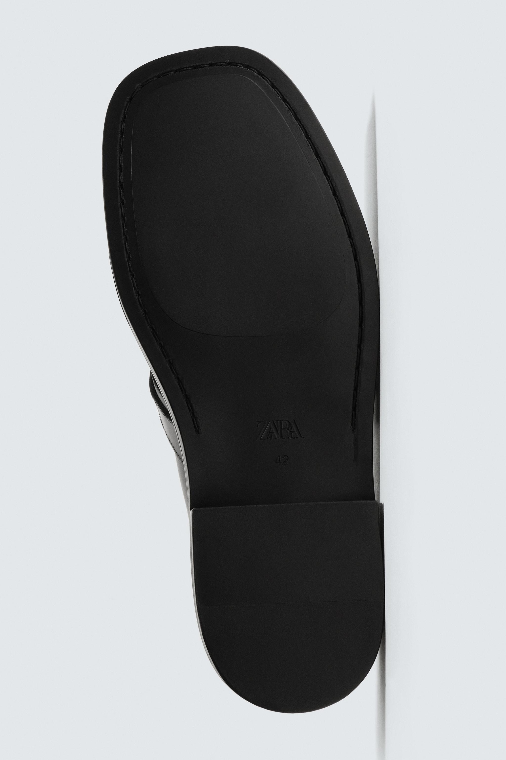 BUCKLED LEATHER CLOGS